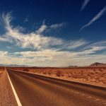 Empty road symbolizing needing SR-22 insurance, which can often feel like a lonely situation.